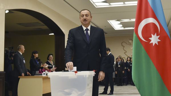 Azerbaijan's President Aliyev casts his ballot at polling station during parliamentary election in Baku - Sputnik International