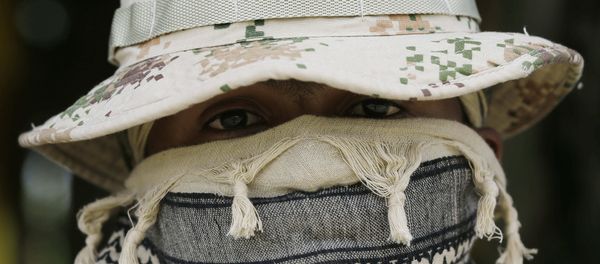 A Colombian Army Special Forces soldier waits to take part in a show of military exercises at the Tolemaida military base - Sputnik International