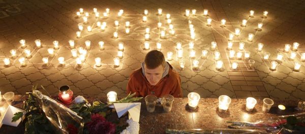 Mourning the Victims of the A321 Crashed in Sinai Mourning the Victims of the A321 Crashed in Sinai - Sputnik International