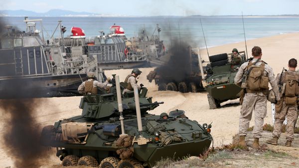 US marine armoured vehicles steers through the soft sand after getting off from a US Navy hovercraft during the NATO Trident Juncture exercise 2015 at Raposa Media beach in Pinheiro da Cruz, south of Lisbon, Tuesday, Oct. 20, 2015. US marine armoured vehicles steers through the soft sand after getting off from a US Navy hovercraft during the NATO Trident Juncture exercise 2015 at Raposa Media beach in Pinheiro da Cruz, south of Lisbon, Tuesday, Oct. 20, 2015. - Sputnik International
