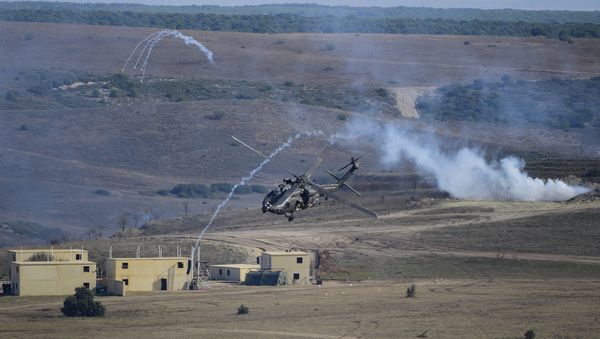 An helicopter takes part in the NATO's Trident Juncture Exercice at San Gregorio training ground near Zaragoza on November 4, 2015. - Sputnik International