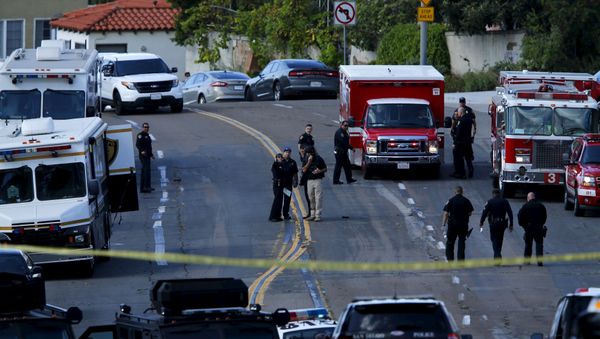Police and fire personnel are seen at the scene of an active shooting with a suspect with a high powered rifle in the Bankers Hills section of San Diego, California, November 4, 2015. Police and fire personnel are seen at the scene of an active shooting with a suspect with a high powered rifle in the Bankers Hills section of San Diego, California, November 4, 2015. - Sputnik International