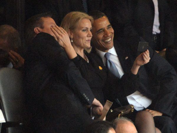 US President Barack Obama (R) and British Prime Minister David Cameron pose for a selfie picture with Denmark's Prime Minister Helle Thorning Schmidt (C) during the memorial service of South African former president Nelson Mandela at the FNB Stadium (Soccer City) in Johannesburg on December 10, 2013. US President Barack Obama (R) and British Prime Minister David Cameron pose for a selfie picture with Denmark's Prime Minister Helle Thorning Schmidt (C) during the memorial service of South African former president Nelson Mandela at the FNB Stadium (Soccer City) in Johannesburg on December 10, 2013. - Sputnik International