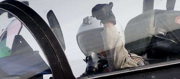 A pilot of a Sukhoi Su-30 fighter jet gestures before taking off at the Hmeymim air base near Latakia, Syria A pilot of a Sukhoi Su-30 fighter jet gestures before taking off at the Hmeymim air base near Latakia, Syria - Sputnik International