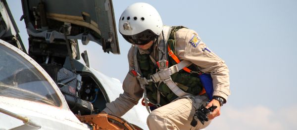 Russian pilot gets into a Su-24 aircraft before taking off at the Khmeimim airbase in Syria Russian pilot gets into a Su-24 aircraft before taking off at the Khmeimim airbase in Syria - Sputnik International