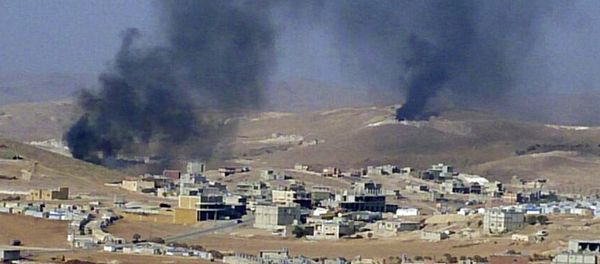 FILE - In this Saturday, Aug. 2, 2014, file photo, smoke billows from the Lebanese town of Arsal, a Sunni Muslim town near the Syrian border in eastern Lebanon. - Sputnik International