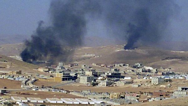 FILE - In this Saturday, Aug. 2, 2014, file photo, smoke billows from the Lebanese town of Arsal, a Sunni Muslim town near the Syrian border in eastern Lebanon. - Sputnik International