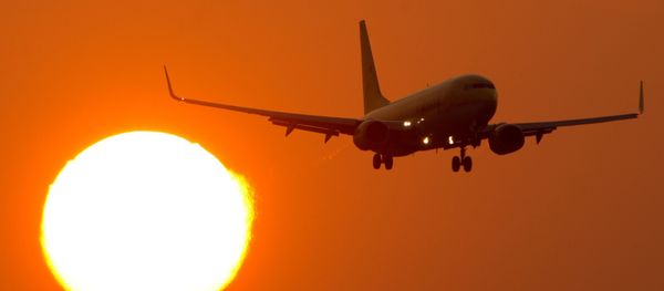 A Boeing 737 flies at the airport Stuttgart, southern Germany, as sun downs on March 14, 2014 A Boeing 737 flies at the airport Stuttgart, southern Germany, as sun downs on March 14, 2014 - Sputnik International