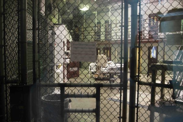 In this file photo, a prisoner stands with his back turned inside Camp 6, a communal unit of the Guantanamo Bay detention center  - Sputnik International