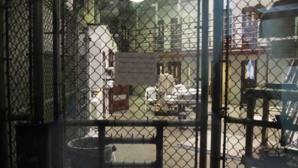 In this file photo, a prisoner stands with his back turned inside Camp 6, a communal unit of the Guantanamo Bay detention center - Sputnik International
