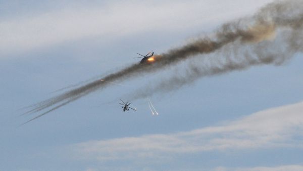 Russian Mi-24p helicopters strike to positions of fighters in 20 kilometers from the city of Palmyra Russian Mi-24p helicopters strike to positions of fighters in 20 kilometers from the city of Palmyra - Sputnik International