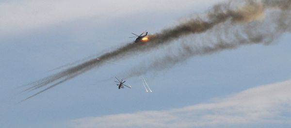 Russian Mi-24p helicopters strike to positions of fighters in 20 kilometers from the city of Palmyra - Sputnik International