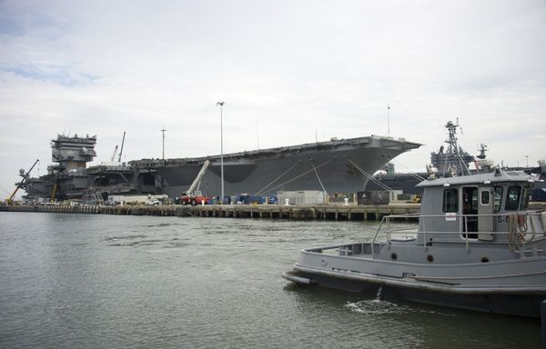 The Navy aircraft carrier USS Enterprise rests at the pier as it is gutted before being official decommissioned at Naval Station Norfolk in Norfolk, Virginia, May 8, 2013, during the Department of Defense's tour deemed Navy 101 - Sputnik International
