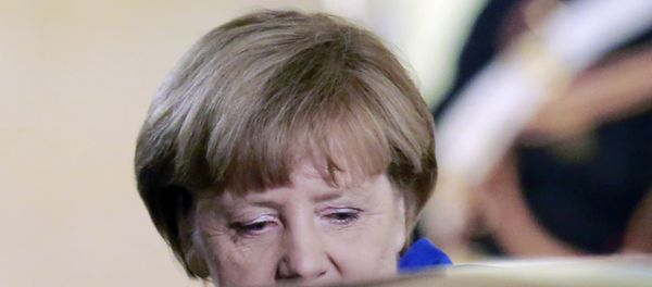 German Chancellor Angela Merkel leaves the Elysee Palace in Paris, France, after a a joint press conference with French President Francois Hollande, Friday, Oct. 2 , 2015. German Chancellor Angela Merkel leaves the Elysee Palace in Paris, France, after a a joint press conference with French President Francois Hollande, Friday, Oct. 2 , 2015. - Sputnik International