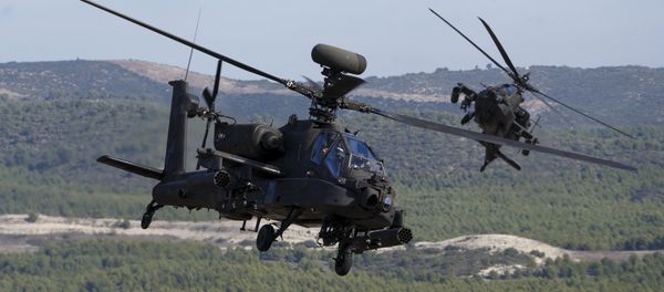 NATO forces in AH-64 Apache helicopters take part in Exercise Trident Juncture 2015, NATO's largest joint and combined military exercise in more than a decade, at the San Gregorio training grounds outside Zaragoza, Spain, November 4, 2015 NATO forces in AH-64 Apache helicopters take part in Exercise Trident Juncture 2015, NATO's largest joint and combined military exercise in more than a decade, at the San Gregorio training grounds outside Zaragoza, Spain, November 4, 2015 - Sputnik International