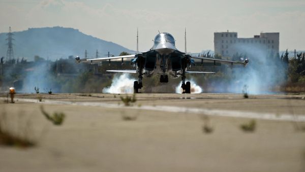A multifunctional fighter-bomber Su-34 of the Russian Aerospace Forces lands at Hemeimeem air base in Syria A multifunctional fighter-bomber Su-34 of the Russian Aerospace Forces lands at Hemeimeem air base in Syria - Sputnik International