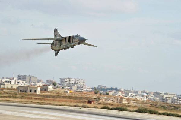 The Soviet-made MiG-23 fighter of the Syrian Air Force flies over the Hama airbase The Soviet-made MiG-23 fighter of the Syrian Air Force flies over the Hama airbase - Sputnik International