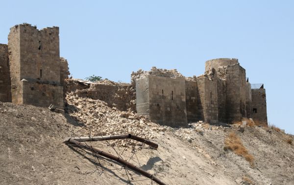 A picture taken on July 12, 2015, shows a damaged wall of Aleppo Citadel following a reported explosion the previous night in a tunnel near the monumental 13th fortress A picture taken on July 12, 2015, shows a damaged wall of Aleppo Citadel following a reported explosion the previous night in a tunnel near the monumental 13th fortress - Sputnik International