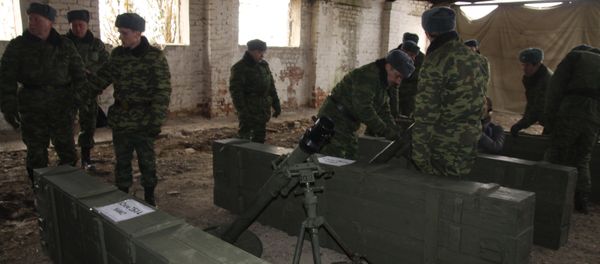 Donetsk units have delivered nine 82mm-caliber mortars to the site of their further storage in the neighborhood of Illovaisk. Under the Minsk accords, the Donetsk People's Republic has accomplished its under-100mm-caliber artillery withdrawal from the contact line - Sputnik International