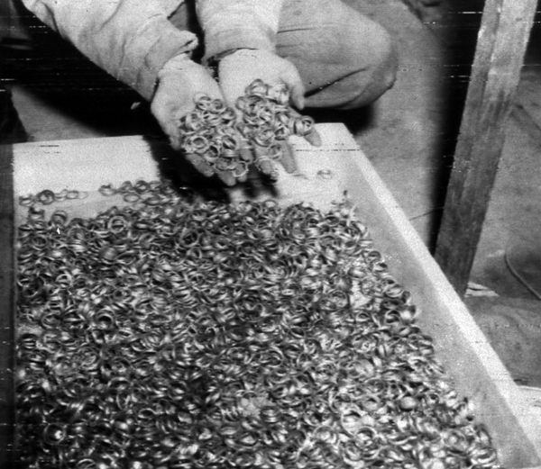 Thousands of wedding rings were found by 1st U.S. Army in a cave adjoining the Buchenwald concentration camp, near Weimar, Germany, May 1945 Thousands of wedding rings were found by 1st U.S. Army in a cave adjoining the Buchenwald concentration camp, near Weimar, Germany, May 1945 - Sputnik International