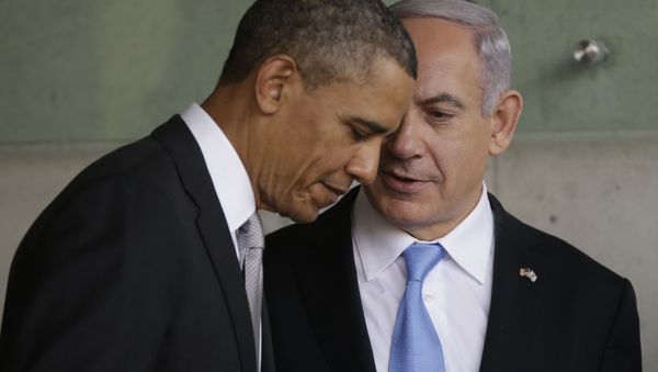 In this Friday, March 22, 2013 file photo, U.S. President Barack Obama, left, listens to Israeli Prime Minister Benjamin Netanyahu during their visit to the Children's Memorial at the Yad Vashem Holocaust memorial in Jerusalem - Sputnik International
