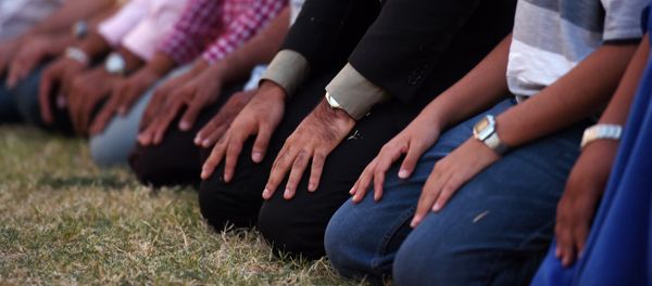 Muslim men kneel to pray in front of MacArthur High School at a prayer vigil in support of Ahmed Mohamed, Thursday, Sept. 17, 2015, in Irving, Texas Muslim men kneel to pray in front of MacArthur High School at a prayer vigil in support of Ahmed Mohamed, Thursday, Sept. 17, 2015, in Irving, Texas - Sputnik International