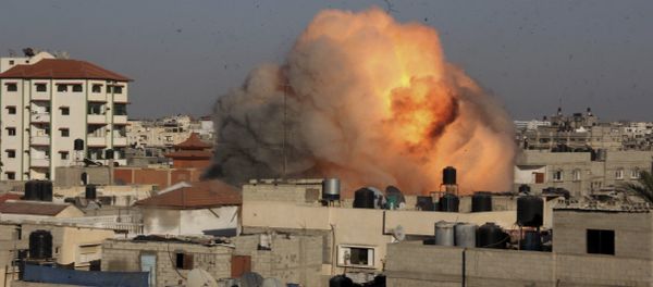 File photo of a ball of fire rises from an explosion following an Israeli air strike on the house in the southern Gaza Strip, Tuesday, Aug. 26, 2014 - Sputnik International
