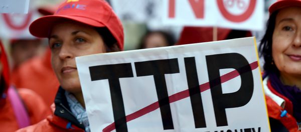 European consumer rights activists take part in a march to protest against the Transatlantic Trade and Investment Partnership (TTIP), austerity and poverty in Brussels, Belgium October 17, 2015 European consumer rights activists take part in a march to protest against the Transatlantic Trade and Investment Partnership (TTIP), austerity and poverty in Brussels, Belgium October 17, 2015 - Sputnik International