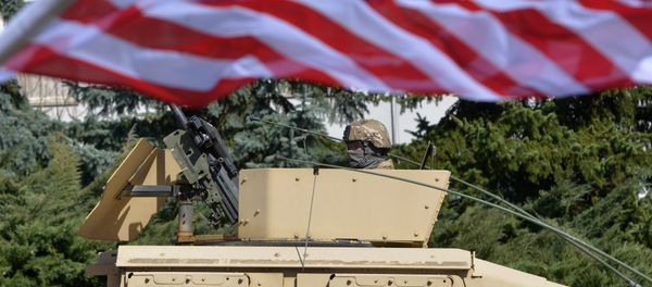 A US soldier looks from the armored vehicle Humvee as US military convoy arrives to the Czech army barracks on March 30, 2015 in Prague after entering the Czech Republic at the border crossing in Harrachov on the way from Baltic countries to base in Vilseck, southern Germany A US soldier looks from the armored vehicle Humvee as US military convoy arrives to the Czech army barracks on March 30, 2015 in Prague after entering the Czech Republic at the border crossing in Harrachov on the way from Baltic countries to base in Vilseck, southern Germany - Sputnik International