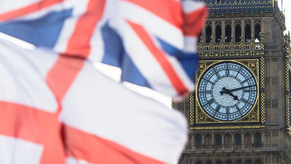 A British Union Jack flag and a flag of England fly in front of Big Ben in the Houses of Parliament in London, Britain, 02 April 2015 - Sputnik International