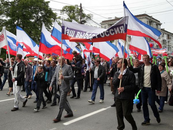 Participants of the May Day demonstration in Crimea's Simferopol with a poster Our choice - Russia. file photo Participants of the May Day demonstration in Crimea's Simferopol with a poster Our choice - Russia. file photo - Sputnik International