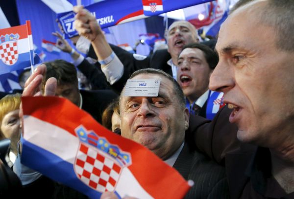 Supporters of the Croatian Democratic Union (HDZ) celebrate after hearing the results of exit polls that put them ahead in Zagreb, Croatia, November 8, 2015 - Sputnik International