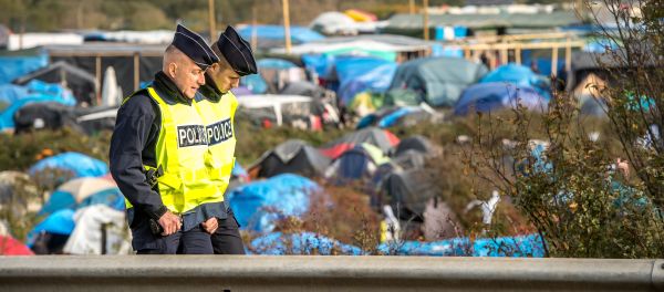 French policemen patrol on November 5, 2015 in the Jungle migrants camp in Calais - Sputnik International