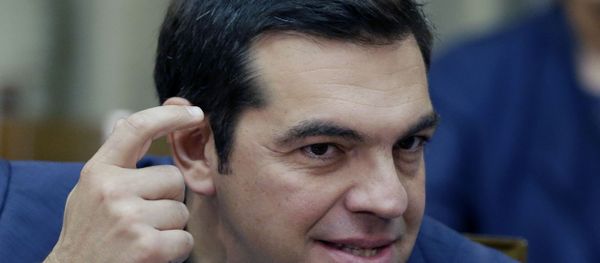 Greece's Prime Minister Alexis Tsipras gestures as he leads the first cabinet meeting of his new government in Athens, Friday, Sept. 25, 2015. - Sputnik International