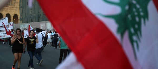 A Lebanese flag A Lebanese flag - Sputnik International