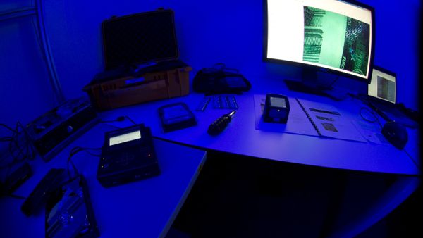 Equipment to analyze a computer hard disk, left, and a scanning device for forged banknotes, right, is displayed in a lab during a media tour at the occasion of the official opening of the Cybercrime Center at Europol headquarters in The Hague, Netherlands, Friday Jan. 11, 2013. - Sputnik International