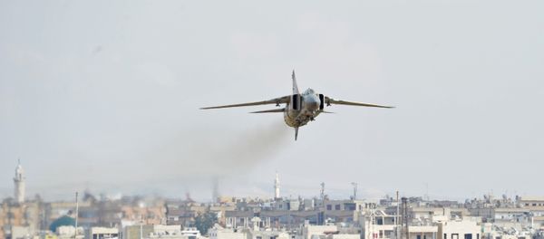A MiG-23 aircraft of the Syrian Air Force lands at the Hama airbase near the city of Hama, Syria's Hama Province. - Sputnik International