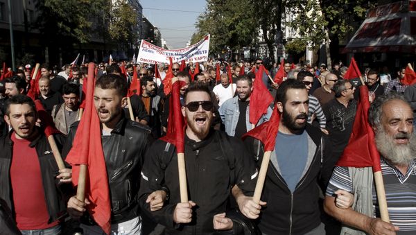 Protesters from the Communist-affiliated trade union PAME take part in an anti-austerity demonstration during a 24-hour general strike in central Athens, Greece November 12, 2015 Protesters from the Communist-affiliated trade union PAME take part in an anti-austerity demonstration during a 24-hour general strike in central Athens, Greece November 12, 2015 - Sputnik International