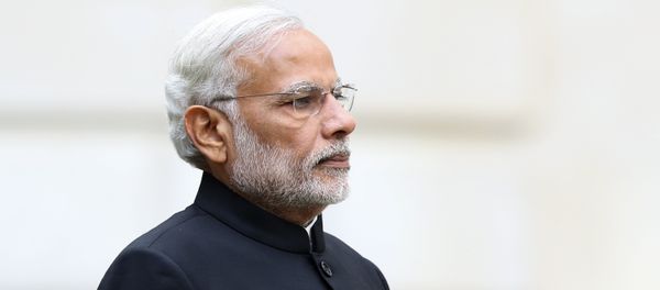 Indian Prime Minister Narendra Modi stands during a welcome ceremony outside the Treasury in London on November 12, 2015 on the first day of a three-day visit to Britain. Indian Prime Minister Narendra Modi stands during a welcome ceremony outside the Treasury in London on November 12, 2015 on the first day of a three-day visit to Britain. - Sputnik International