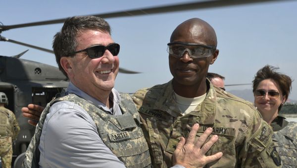 In this photo provided by the Department of Defense, then-U.S. Army Brig. Gen. Ron Lewis, right, greets then-Deputy Secretary of Defense Ash Carter, left, in Jalalabad, Afghanistan, May 13, 2013 In this photo provided by the Department of Defense, then-U.S. Army Brig. Gen. Ron Lewis, right, greets then-Deputy Secretary of Defense Ash Carter, left, in Jalalabad, Afghanistan, May 13, 2013 - Sputnik International