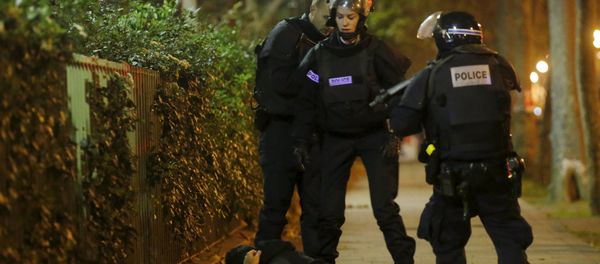 A man lies on the ground as French police check his identity near the Bataclan concert hall following fatal shootings in Paris, France, November 13, 2015 A man lies on the ground as French police check his identity near the Bataclan concert hall following fatal shootings in Paris, France, November 13, 2015 - Sputnik International