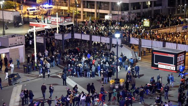 Football fans leave the Stade de France stadium following the friendly football match between France and Germany in Saint-Denis, north of Paris, on November 13, 2015, after a series of gun attacks occurred across Paris as well as explosions outside the national stadium where France was hosting Germany - Sputnik International