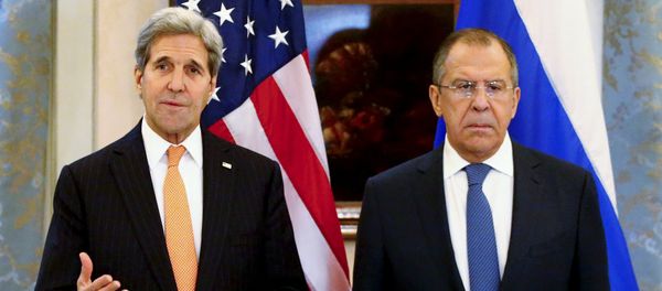 Russia's Foreign Minister Sergei Lavrov (R) and U.S. Secretary of State John Kerry address the media before a meeting in Vienna, Austria, November 14, 2015 Russia's Foreign Minister Sergei Lavrov (R) and U.S. Secretary of State John Kerry address the media before a meeting in Vienna, Austria, November 14, 2015 - Sputnik International