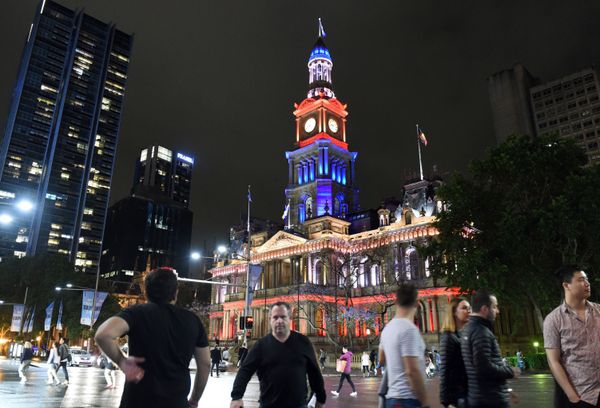 The Town Hall of Sydney, Australia, lit up in French national colors in remembrance of the victims of the November 13th Paris terror attacks. The famous Sydney Opera House was bathed in the French colors, as well. - Sputnik International