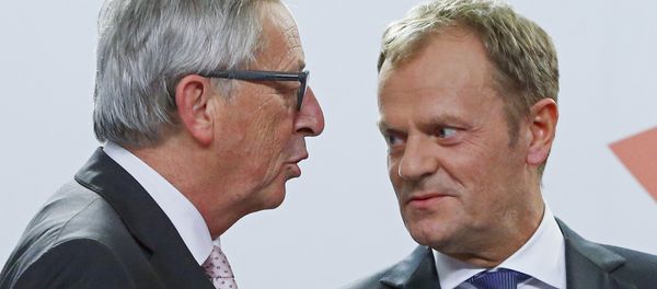 European Commission President Jean Claude Juncker (L) and European Council President Donald Tusk talk together after a news conference after the Valletta Summit on Migration, followed by an informal meeting of European Union heads of state and government in Valletta, Malta, November 12, 2015 European Commission President Jean Claude Juncker (L) and European Council President Donald Tusk talk together after a news conference after the Valletta Summit on Migration, followed by an informal meeting of European Union heads of state and government in Valletta, Malta, November 12, 2015 - Sputnik International