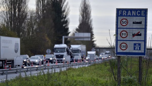 A view shows vehicles queueing in the highway from Paris to Brussels as Belgian and French police officers control the crossing of vehicles on the border between the two countries, following the deadly Paris attacks, in Crespin, France, November 14, 2015 A view shows vehicles queueing in the highway from Paris to Brussels as Belgian and French police officers control the crossing of vehicles on the border between the two countries, following the deadly Paris attacks, in Crespin, France, November 14, 2015 - Sputnik International