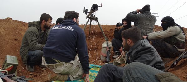 Opposition fighters from the Ahrar Al-Sham brigade, part of the Islamic front coalition, hold a position in the Sheikh Lutfi neighbourhood of the northern Syrian city of Aleppo during ongoing clashes with government forces on January 27, 2014 Opposition fighters from the Ahrar Al-Sham brigade, part of the Islamic front coalition, hold a position in the Sheikh Lutfi neighbourhood of the northern Syrian city of Aleppo during ongoing clashes with government forces on January 27, 2014 - Sputnik International
