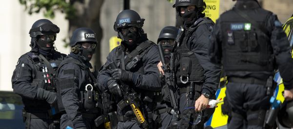 Near the start of a training exercise for London's emergency services, armed police officers stand near the disused Aldwych underground train station in London, Tuesday, June 30, 2015 - Sputnik International