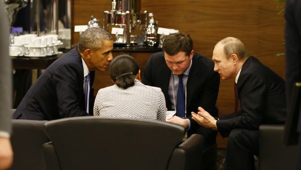 U.S. President Barack Obama, left, speaks with Russian President Vladimir Putin, right prior to the opening session of the G-20 summit in Antalya, Turkey, Sunday, Nov. 15 2015 - Sputnik International