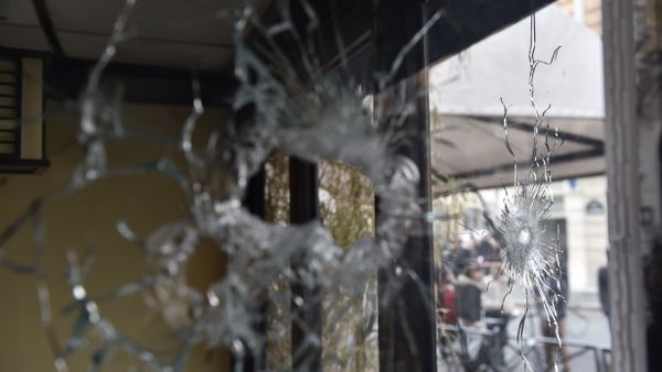 Bullet holes are seen in the window of a Japanese restaurant next to the cafe 'La Belle Equipe' at the Rue de Charonne in Paris on November 14, 2015, following a series of coordinated attacks in and around Paris late Friday Bullet holes are seen in the window of a Japanese restaurant next to the cafe 'La Belle Equipe' at the Rue de Charonne in Paris on November 14, 2015, following a series of coordinated attacks in and around Paris late Friday - Sputnik International
